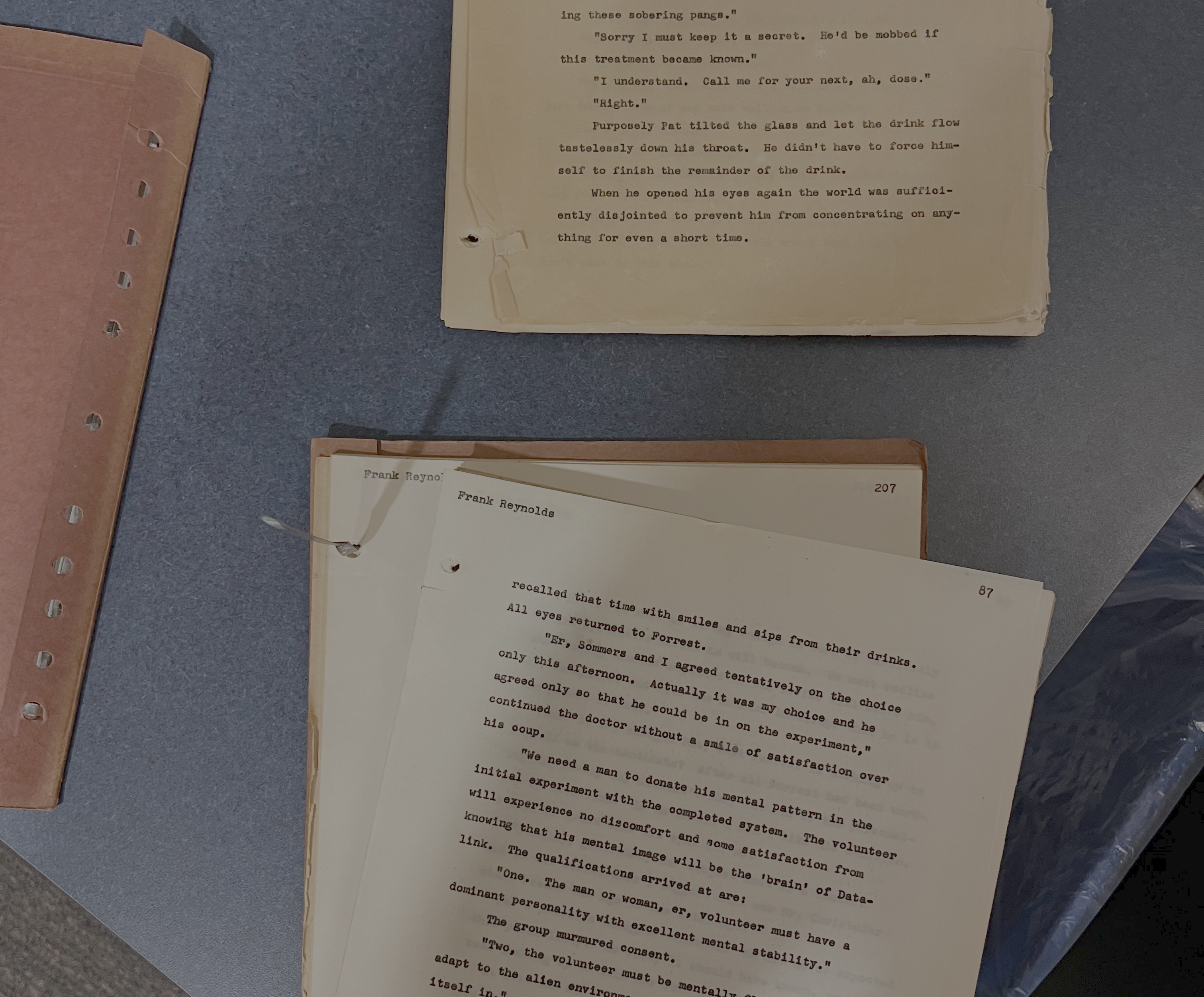 Frank Reynolds' original 1960s typewritten manuscript pages for THE LINK, on a desk waiting to be scanned